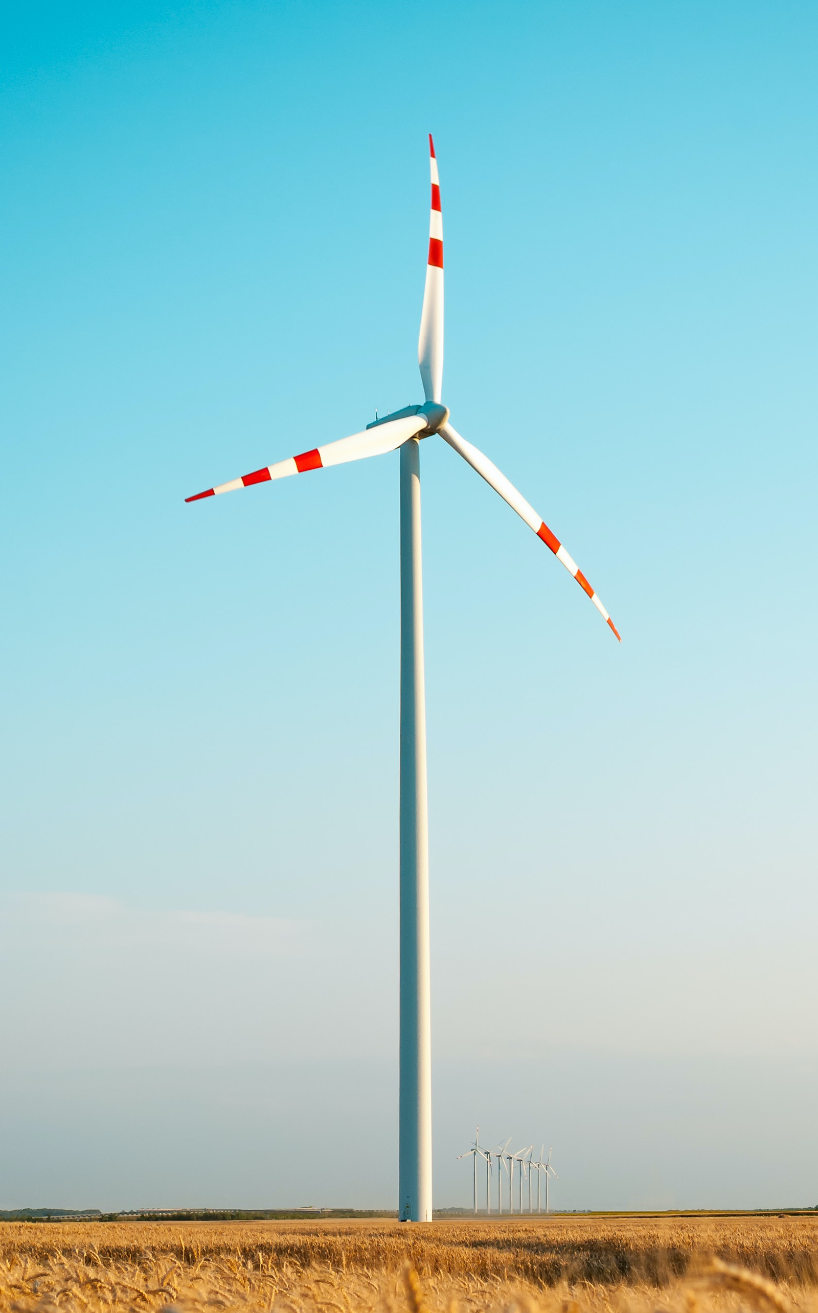 Tall Industrial Wind Energy Turbine Rural Field 