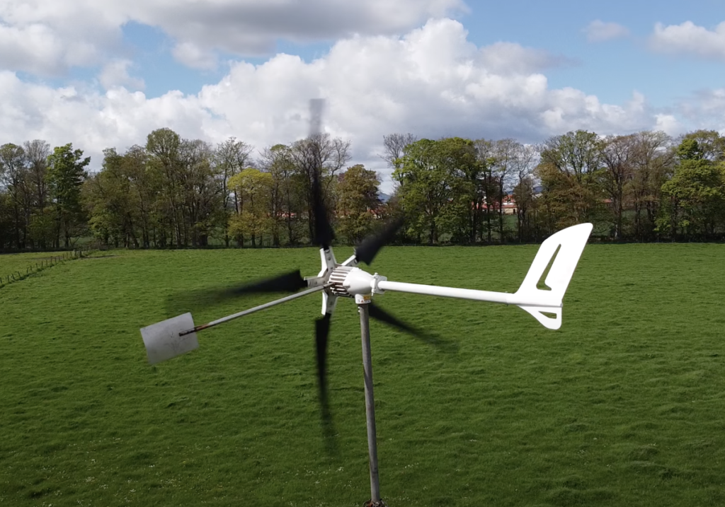 Residential Wind Turbine installed at ground level in backyard open field